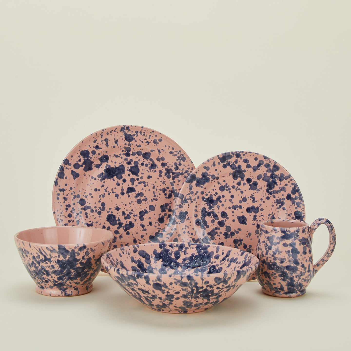 Splatter dinnerware family in pink and blue
