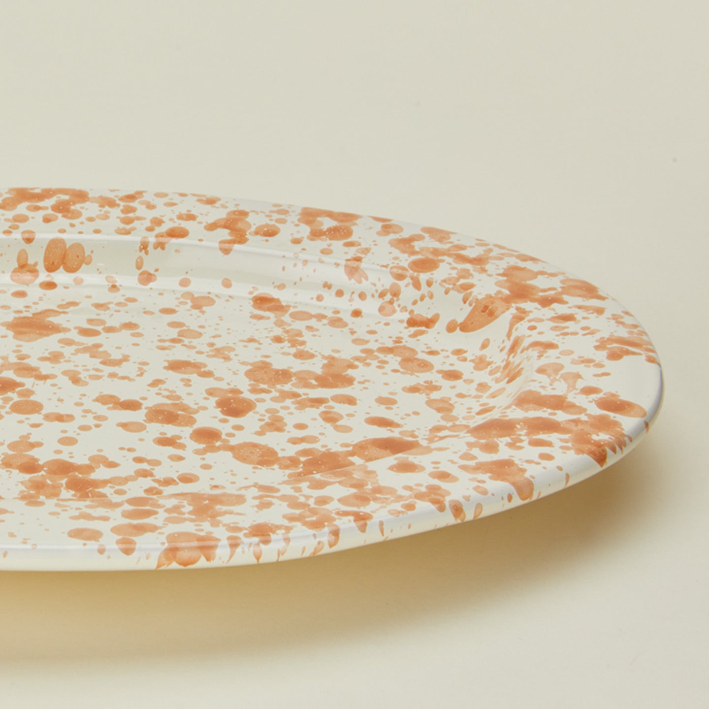 Close up view of Ivory and tan oval platter