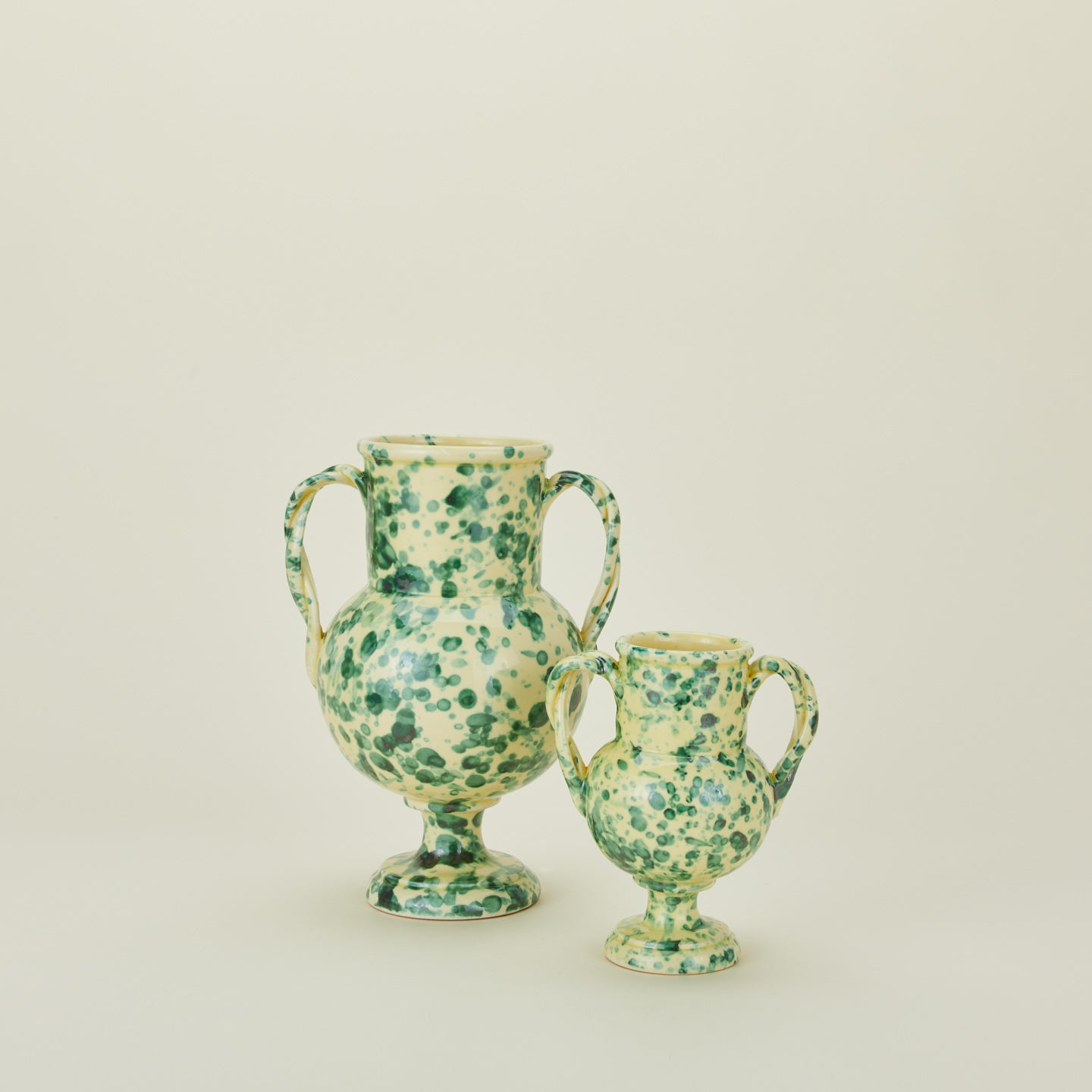 Yellow and green splatter verona vases in large and small