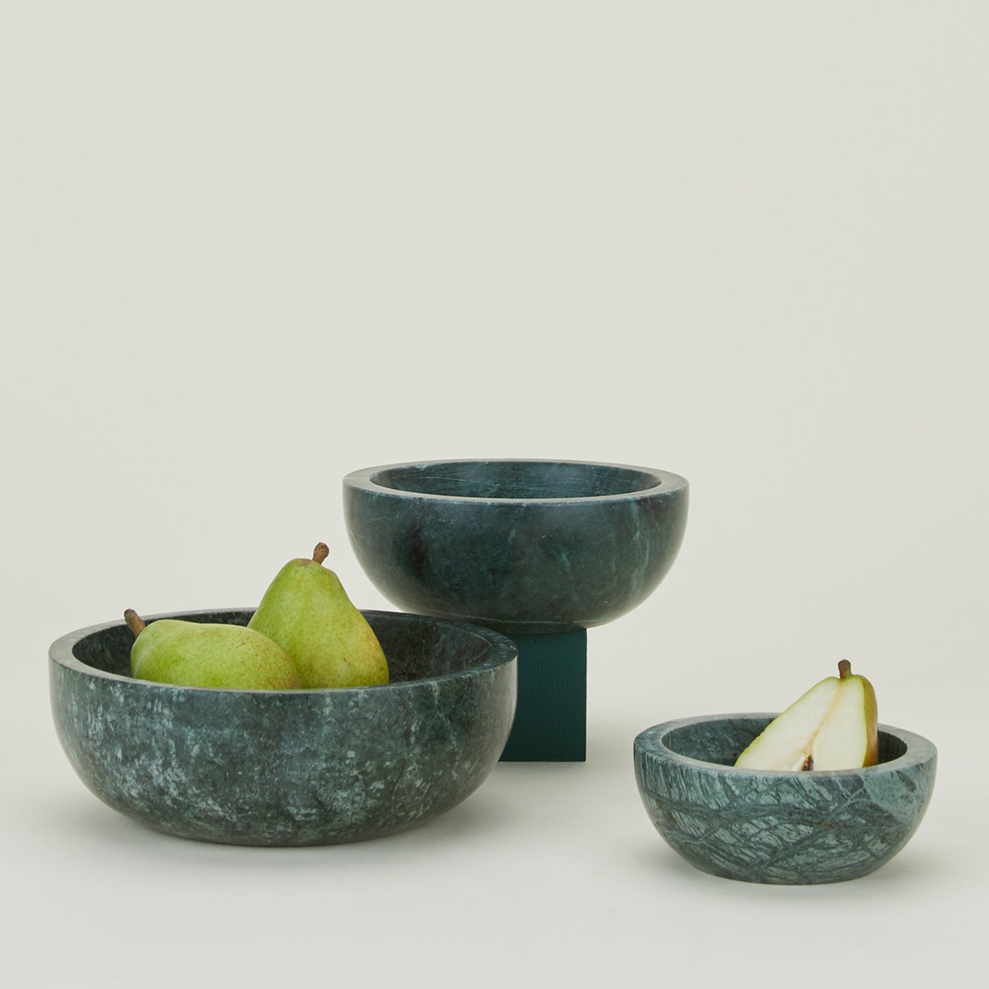 Three Simple Marble Bowls in various sizes in Green, with pears.