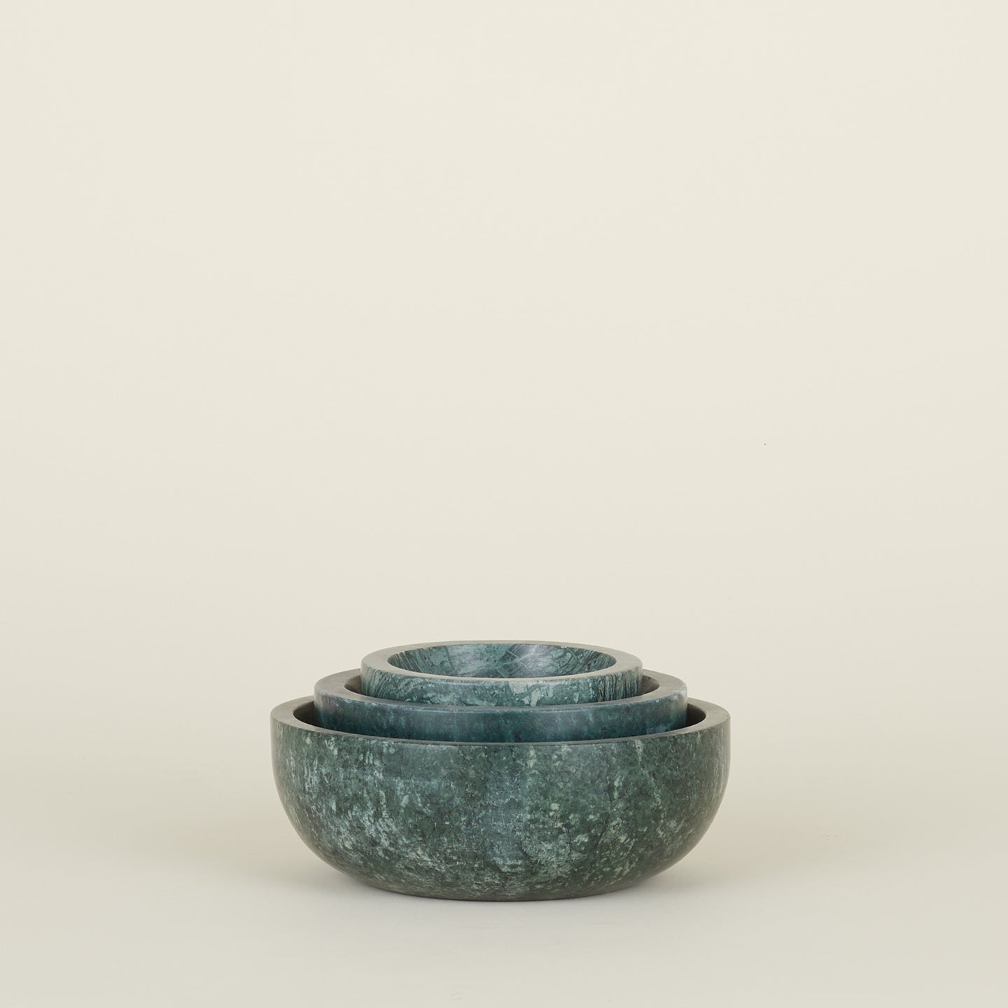 Three Simple Marble Bowls in various sizes in Green,nested.