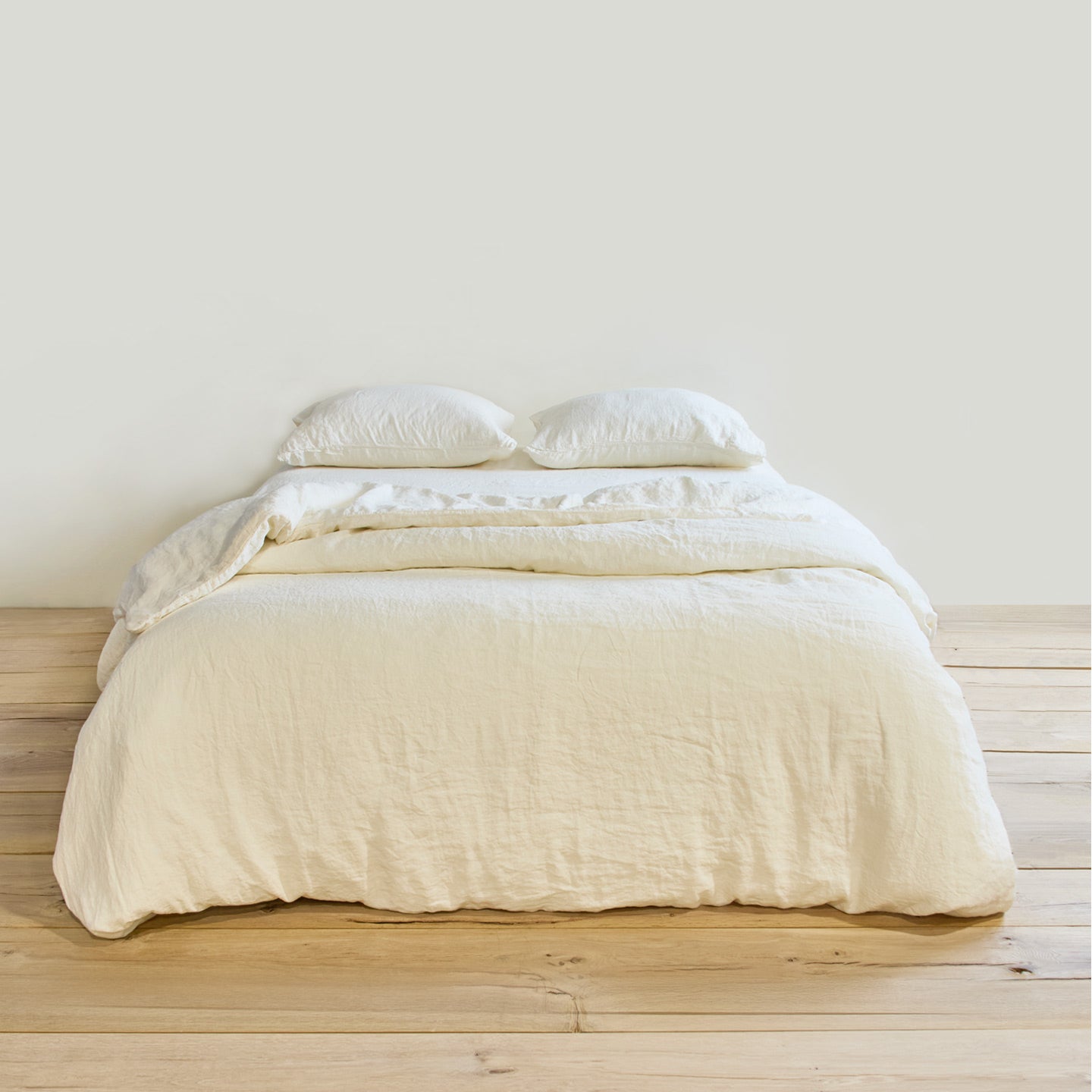 Simple linen bedding in ivory