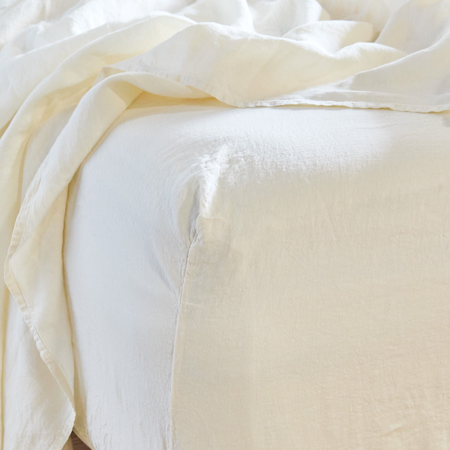 Simple linen bedding in ivory