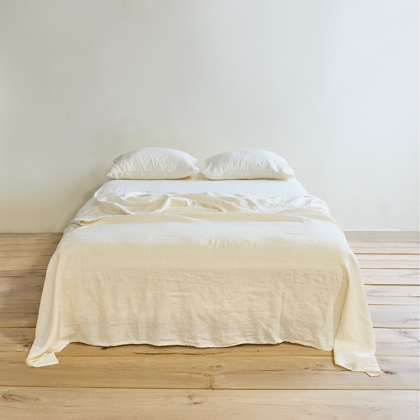 Simple linen bedding in ivory