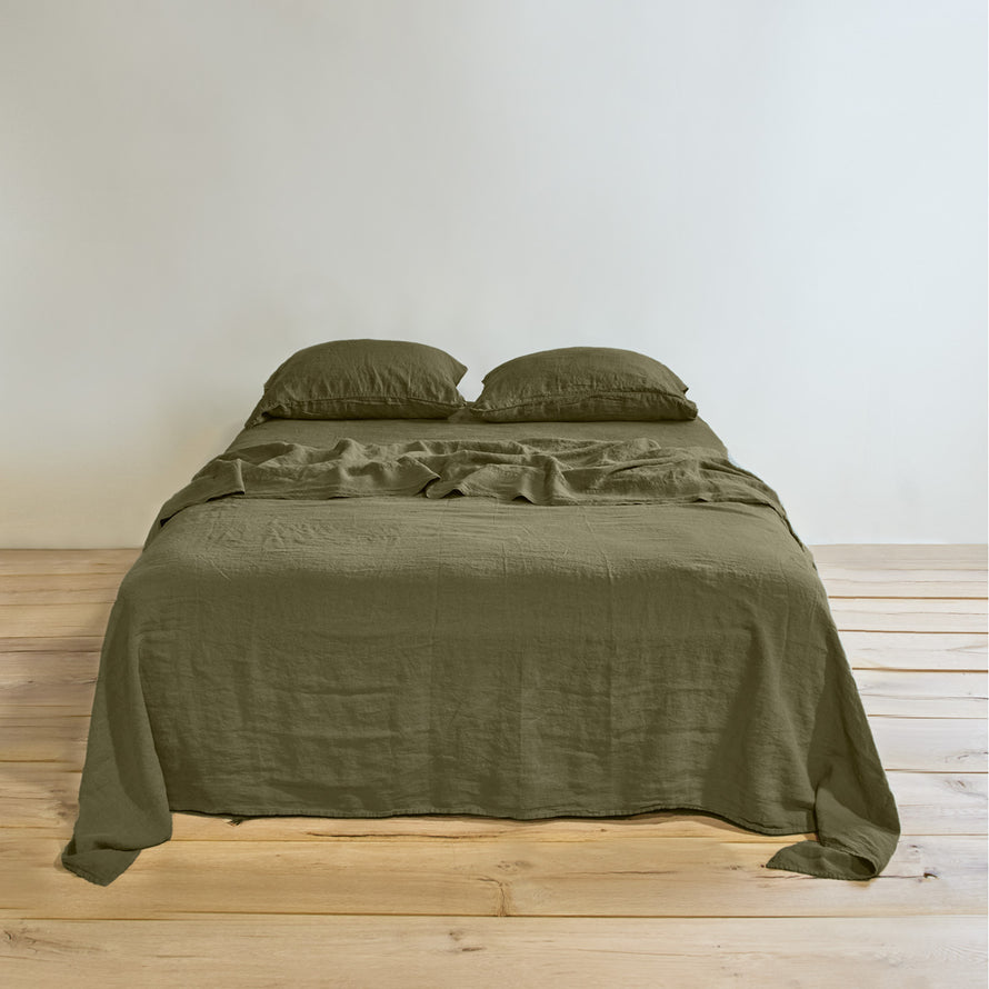 Simple linen bedding in olive
