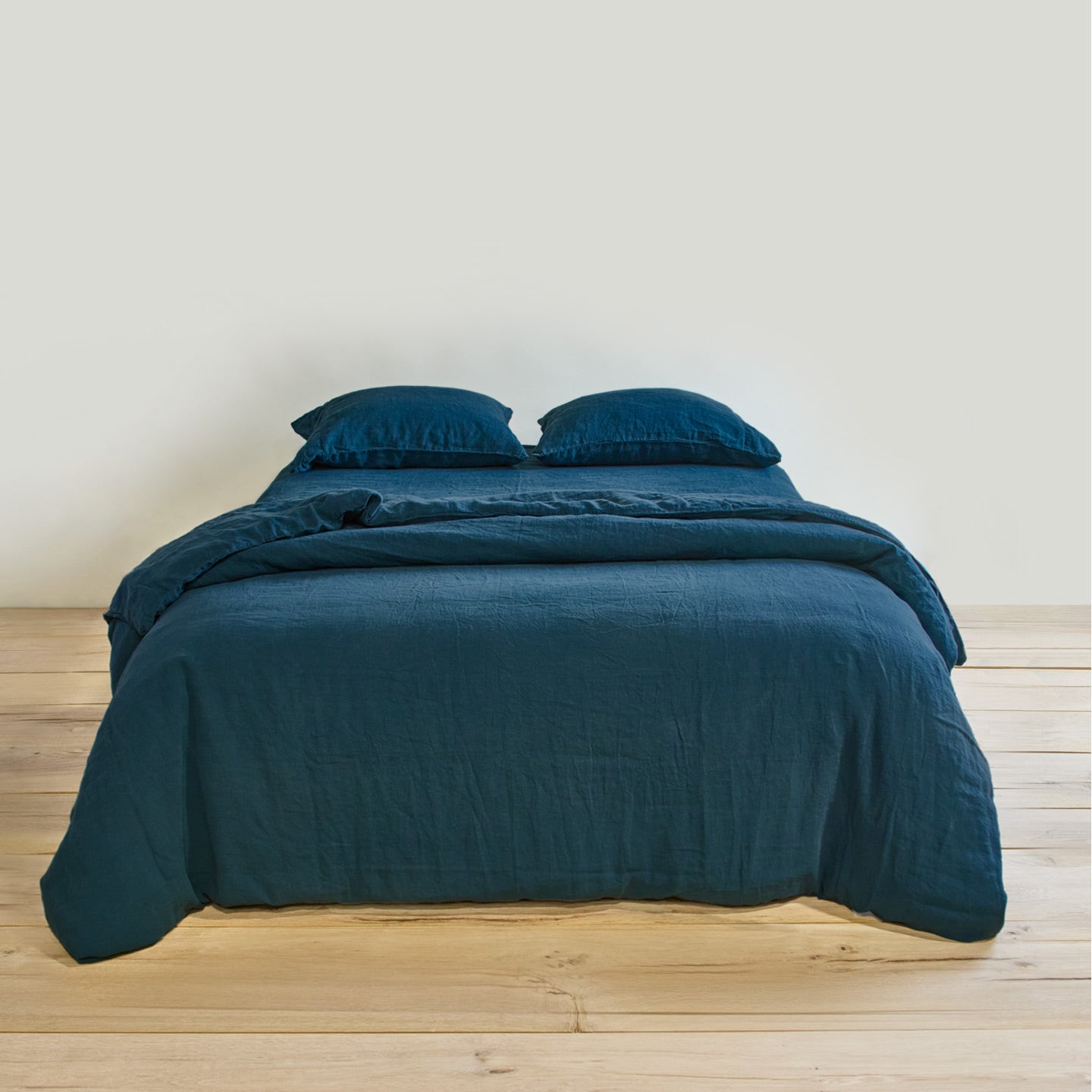 Simple linen bedding in peacock