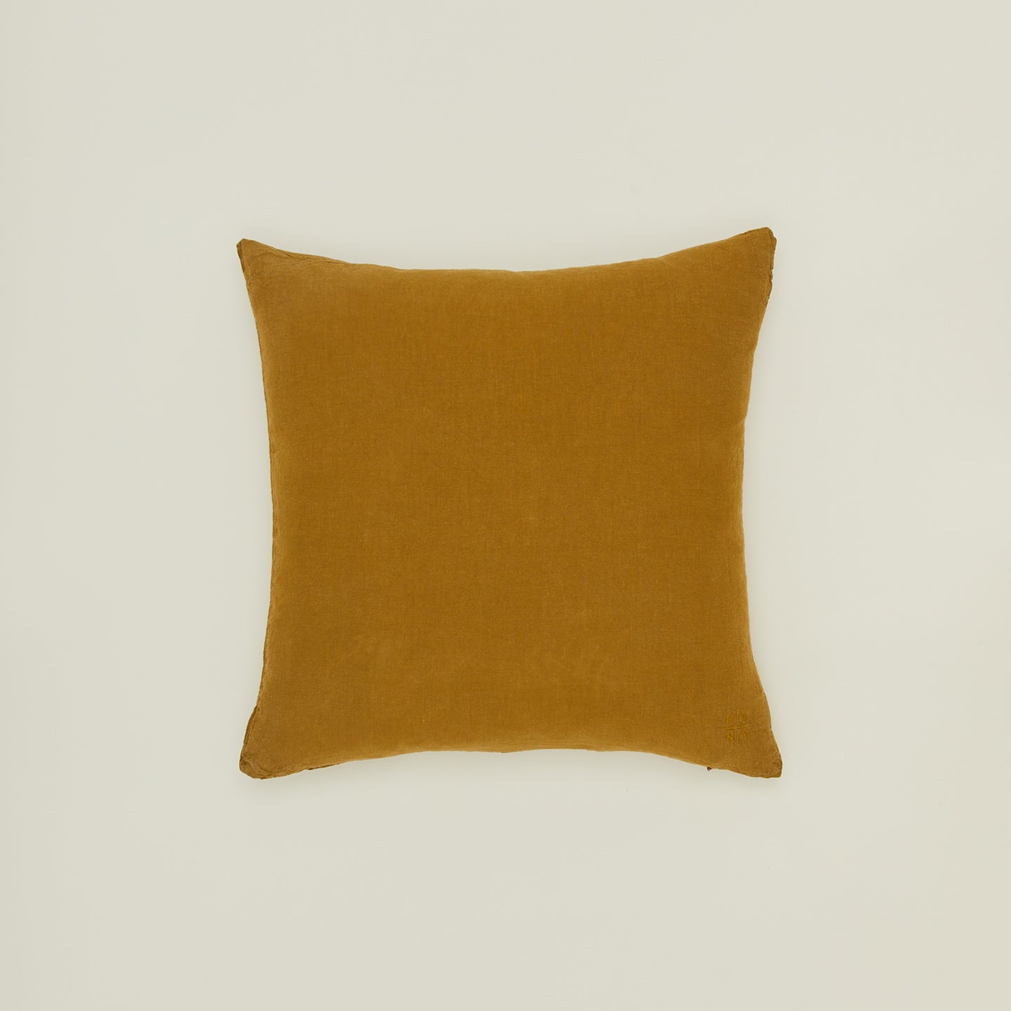 Simple linen pillow in bronze