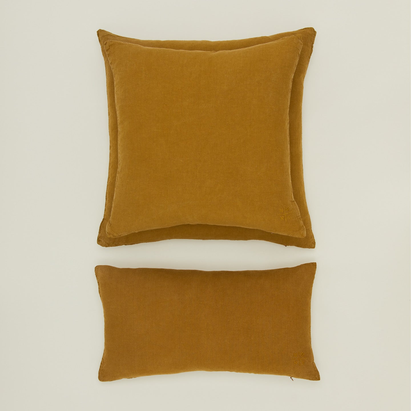 Simple linen pillow in bronze