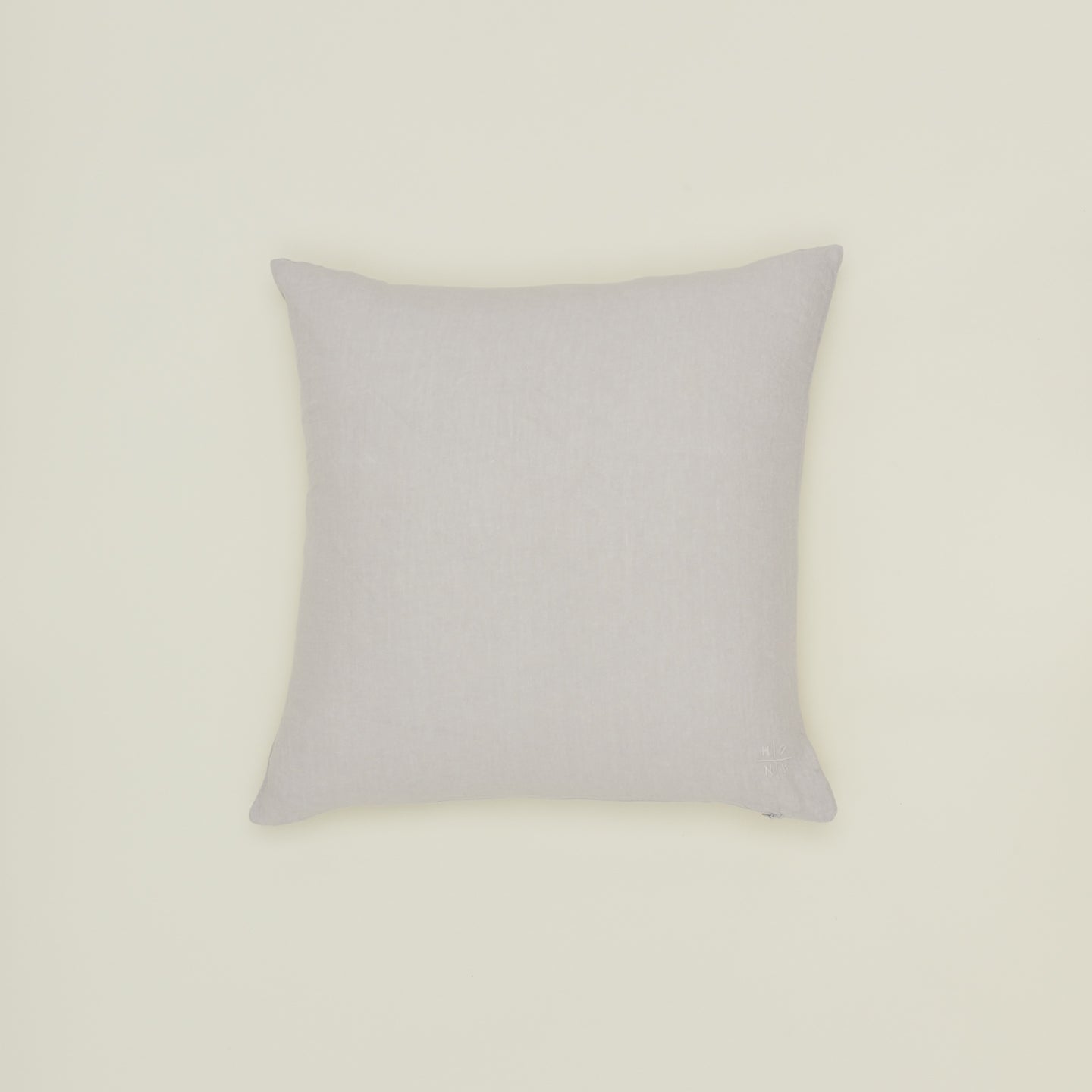Simple linen pillow in light grey