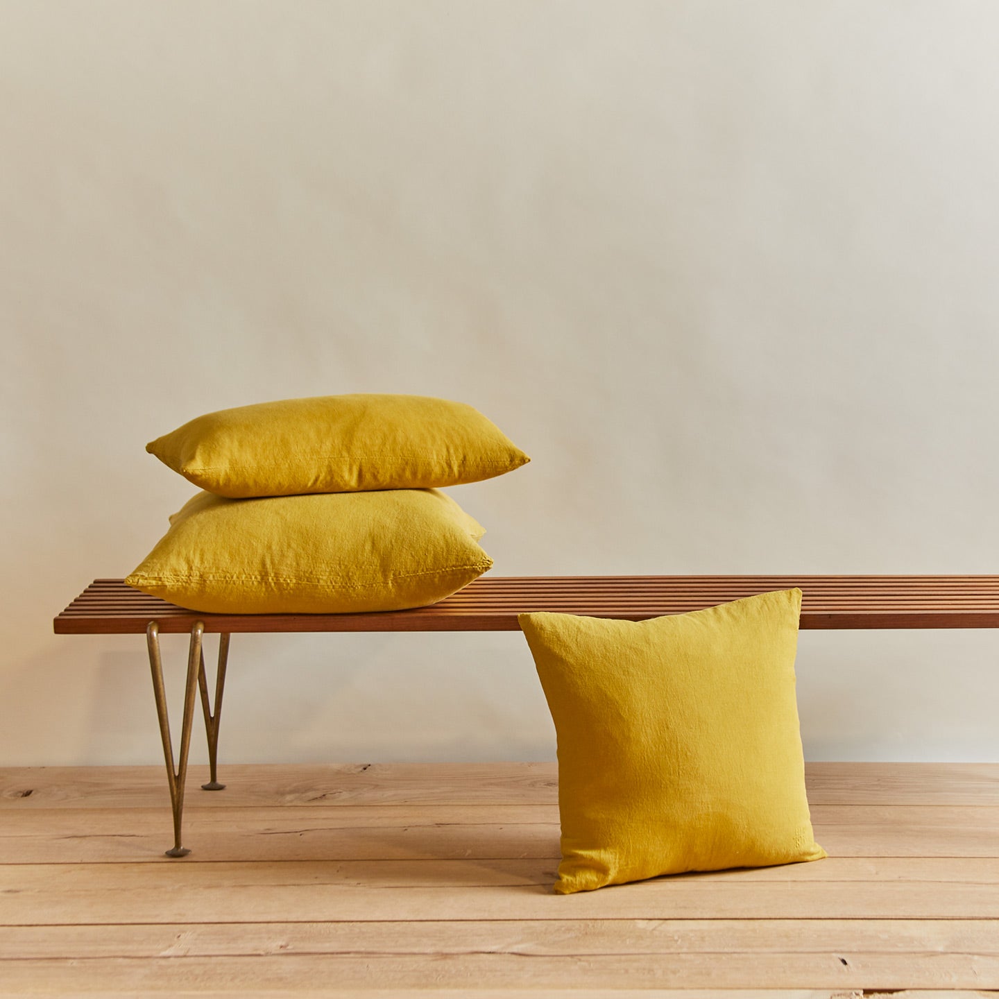 Simple linen pillow in mustard