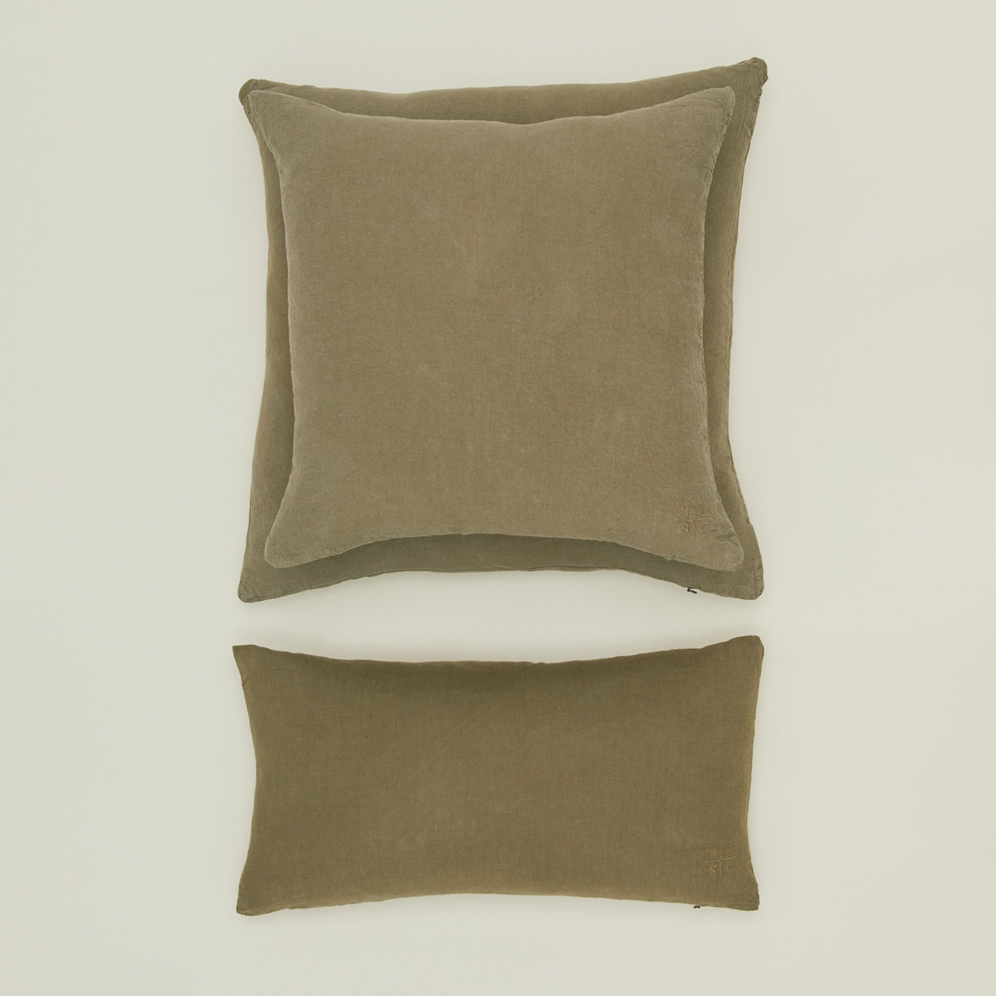 Simple linen pillow in olive