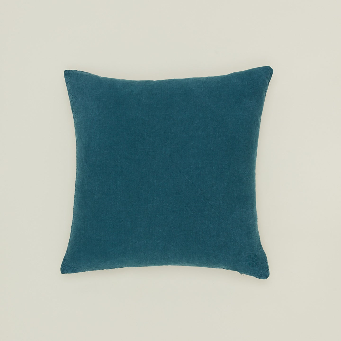 Simple linen pillow in peacock