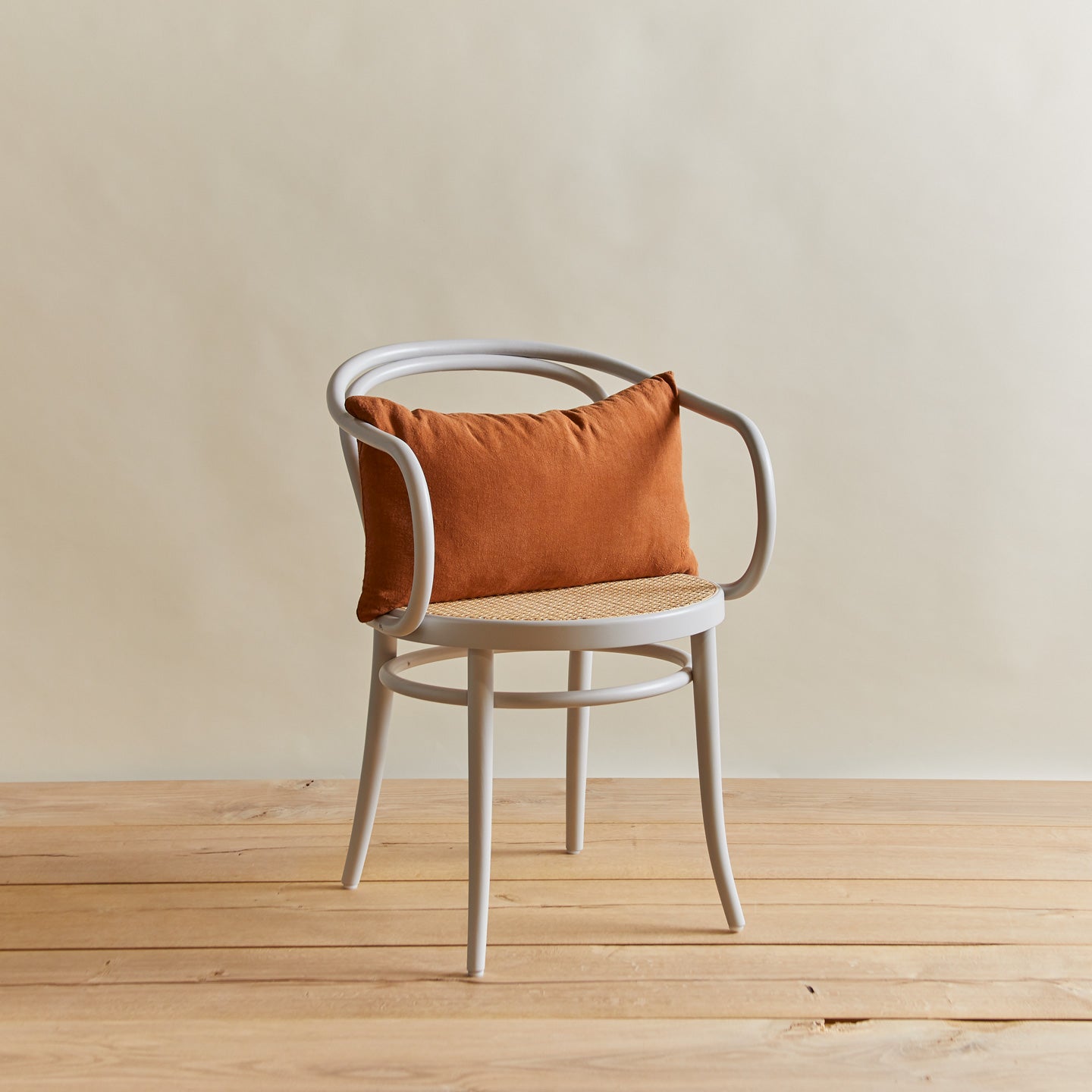 Simple linen pillow in terracotta