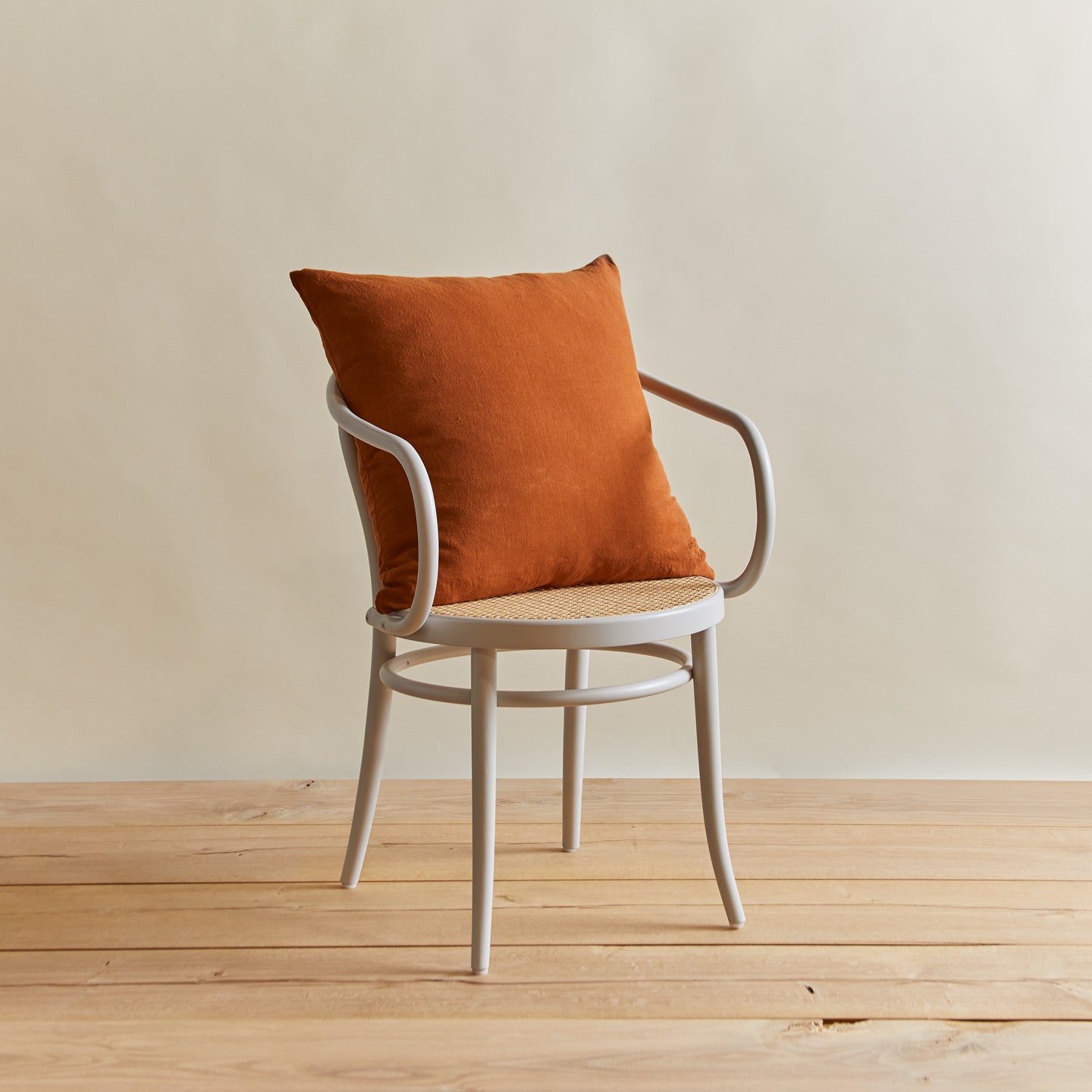 Simple linen pillow in terracotta