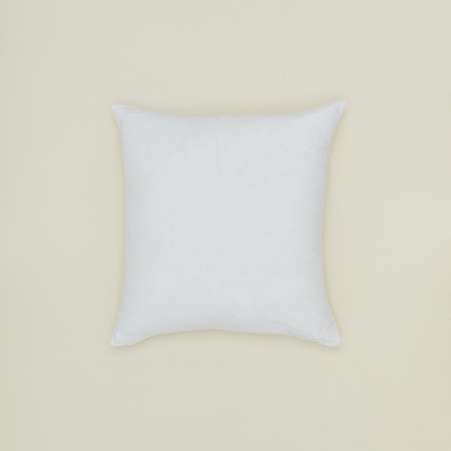 Simple linen pillow in white