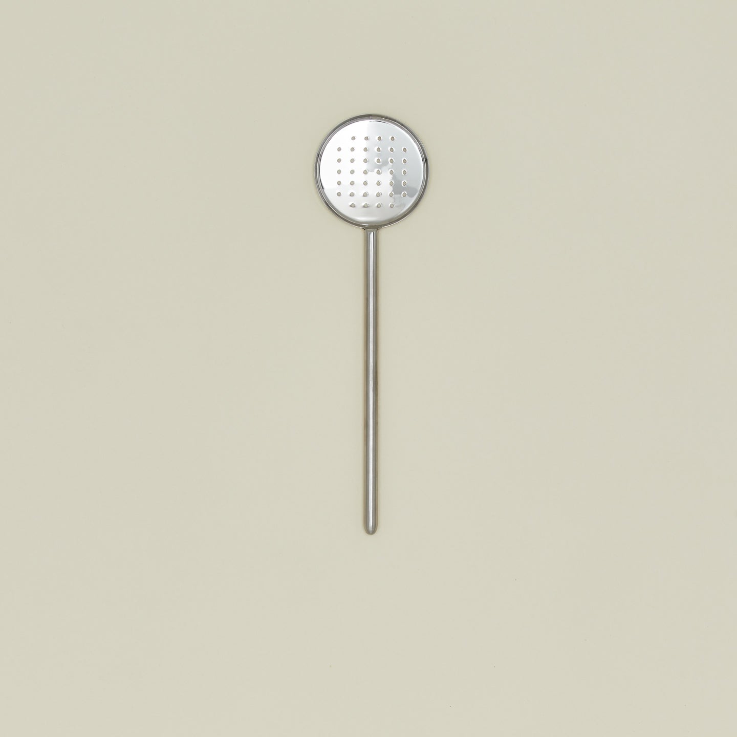 Simple metal flat slotted spoon in silver