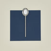 Simple metal slotted spoon in silver