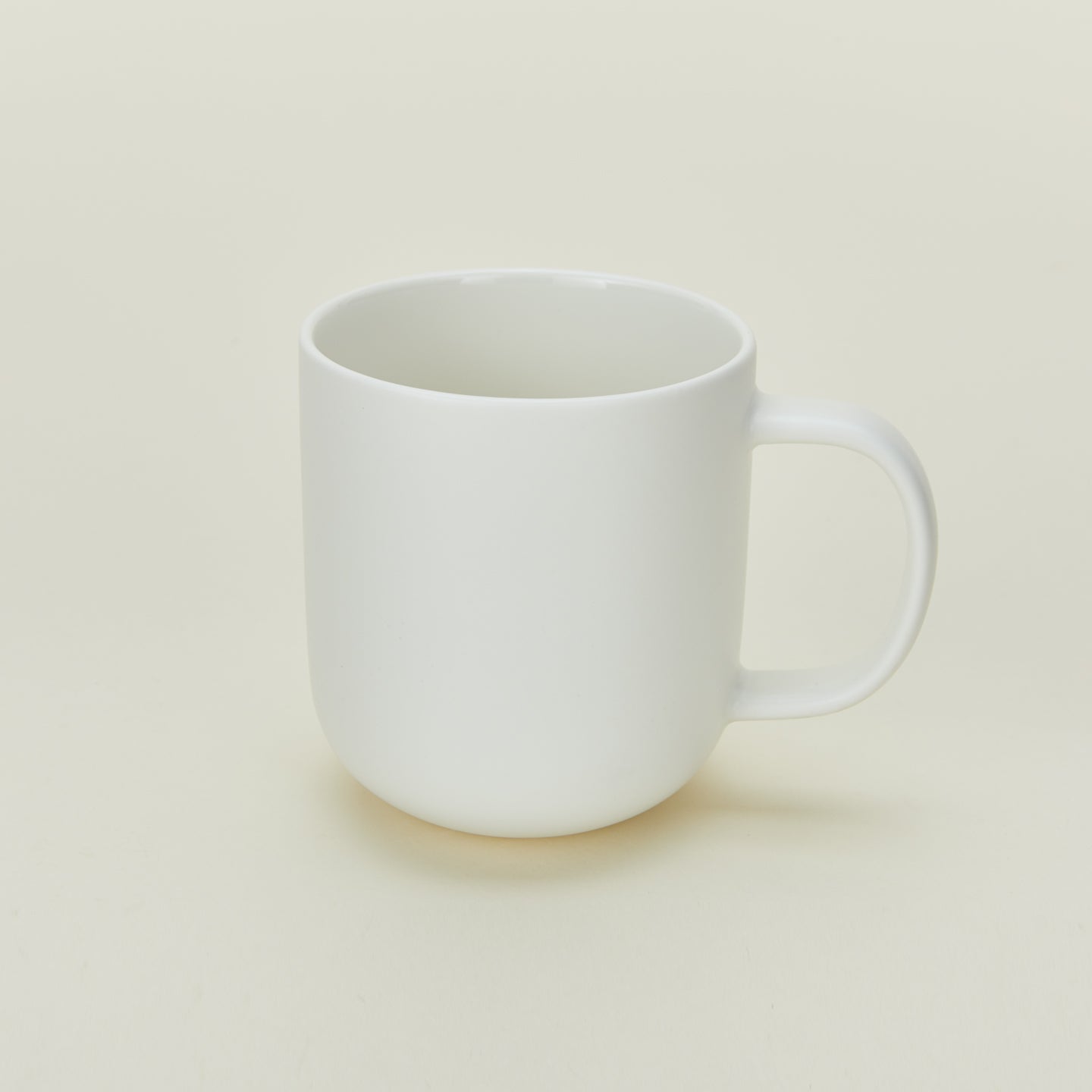 Simple porcelain mug in white