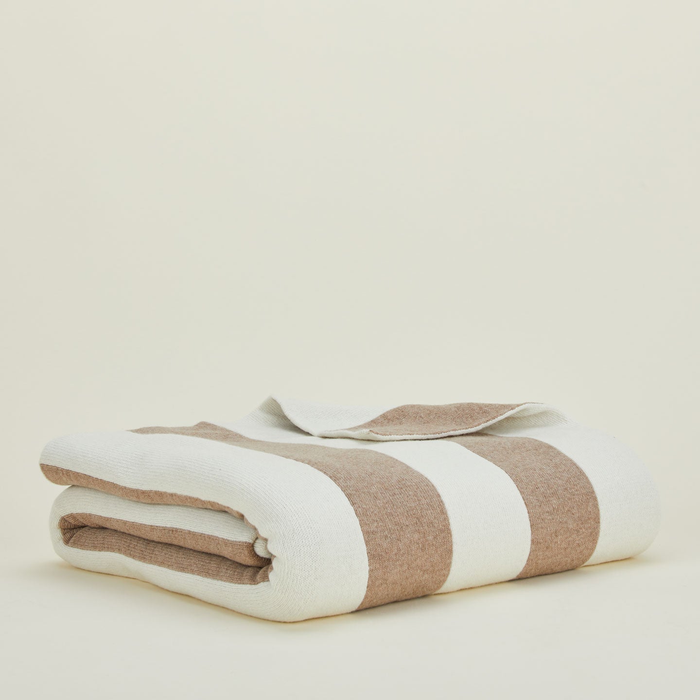 Folded simple striped throw in ivory and flax