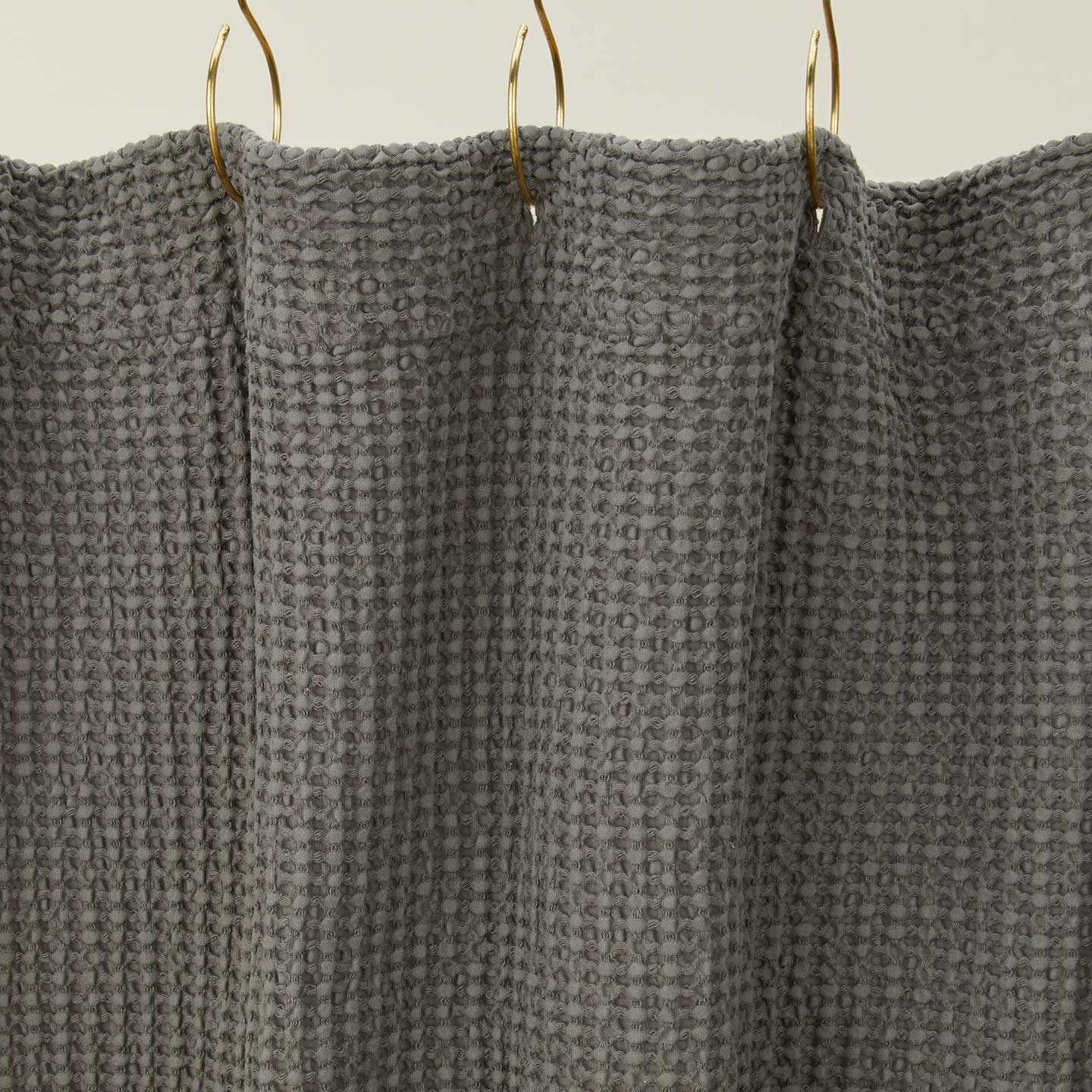 Simple waffle shower curtain in dark grey