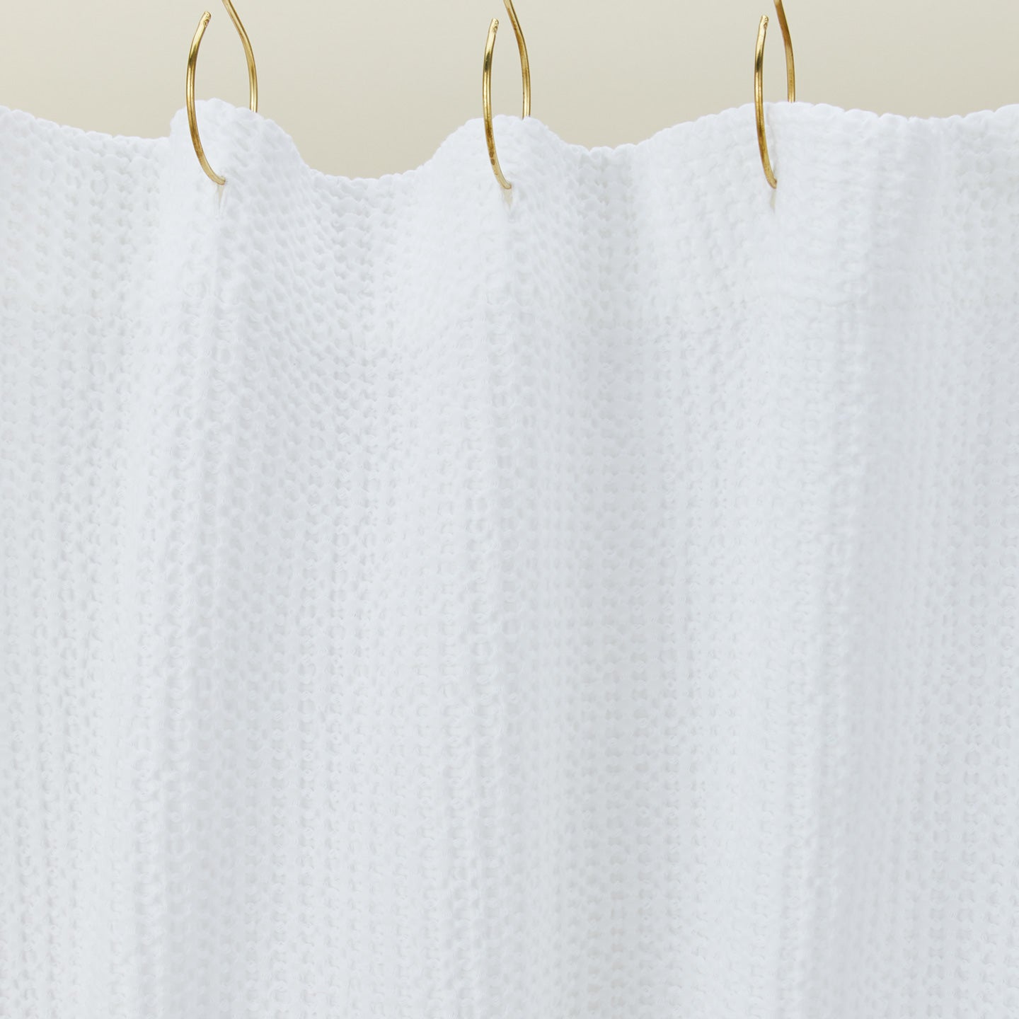 Simple waffle shower curtain in white
