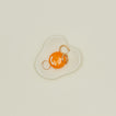 Overhead view of Egg Ceramic Dish with earrings
