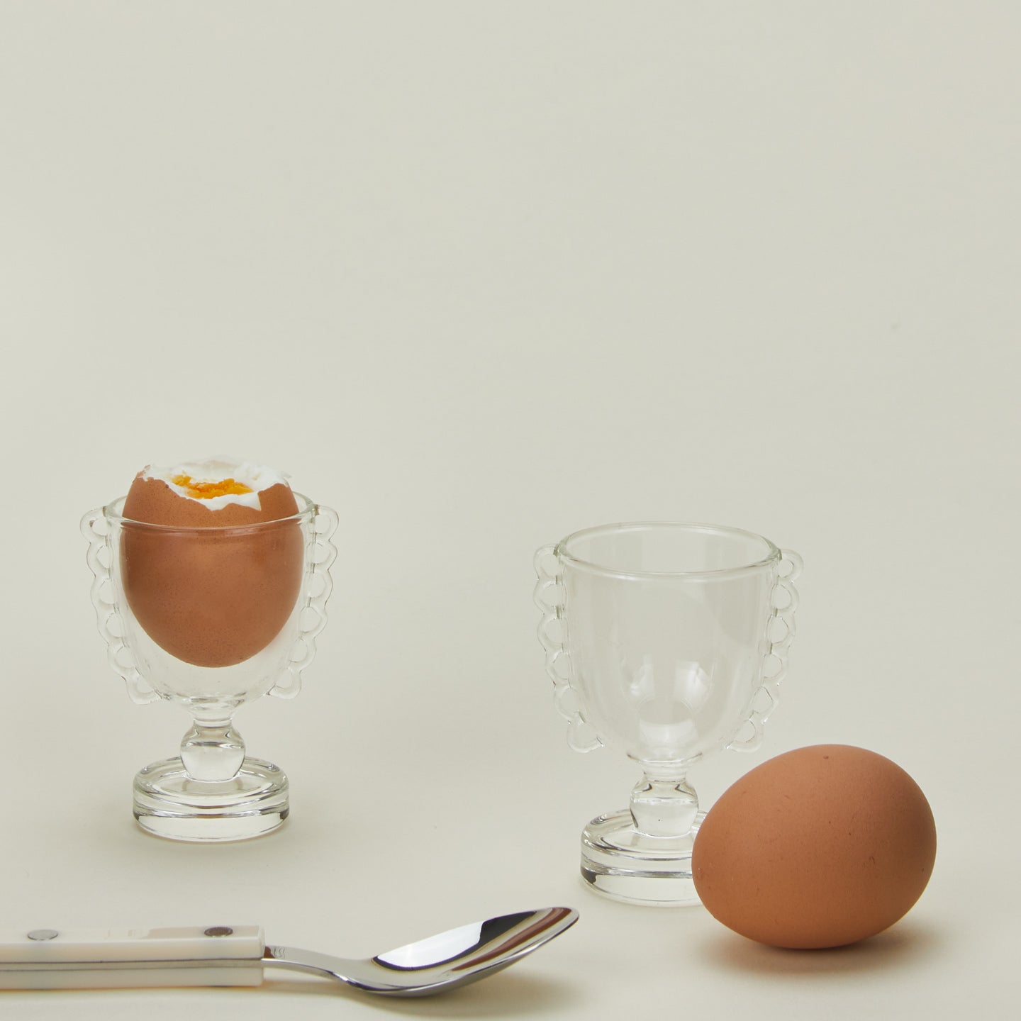 Coco Egg Cups with eggs and spoon