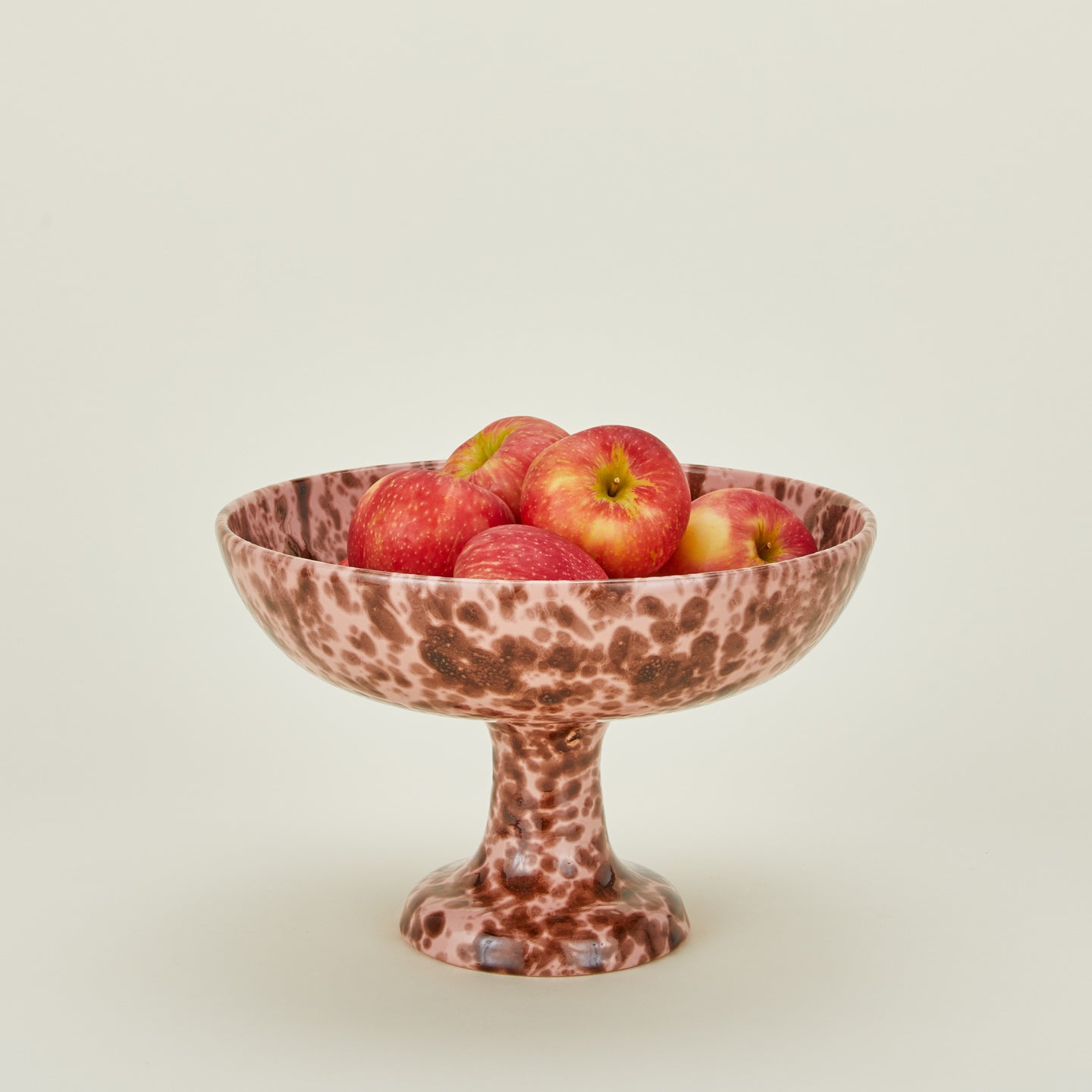 Splatterware footed bowl in blush and terracotta with apples