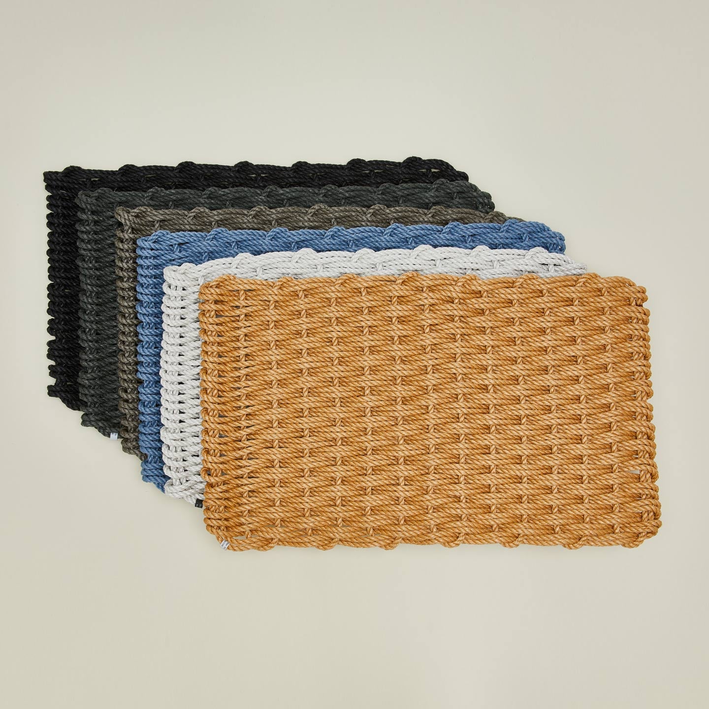 Woven doormat family in various colors