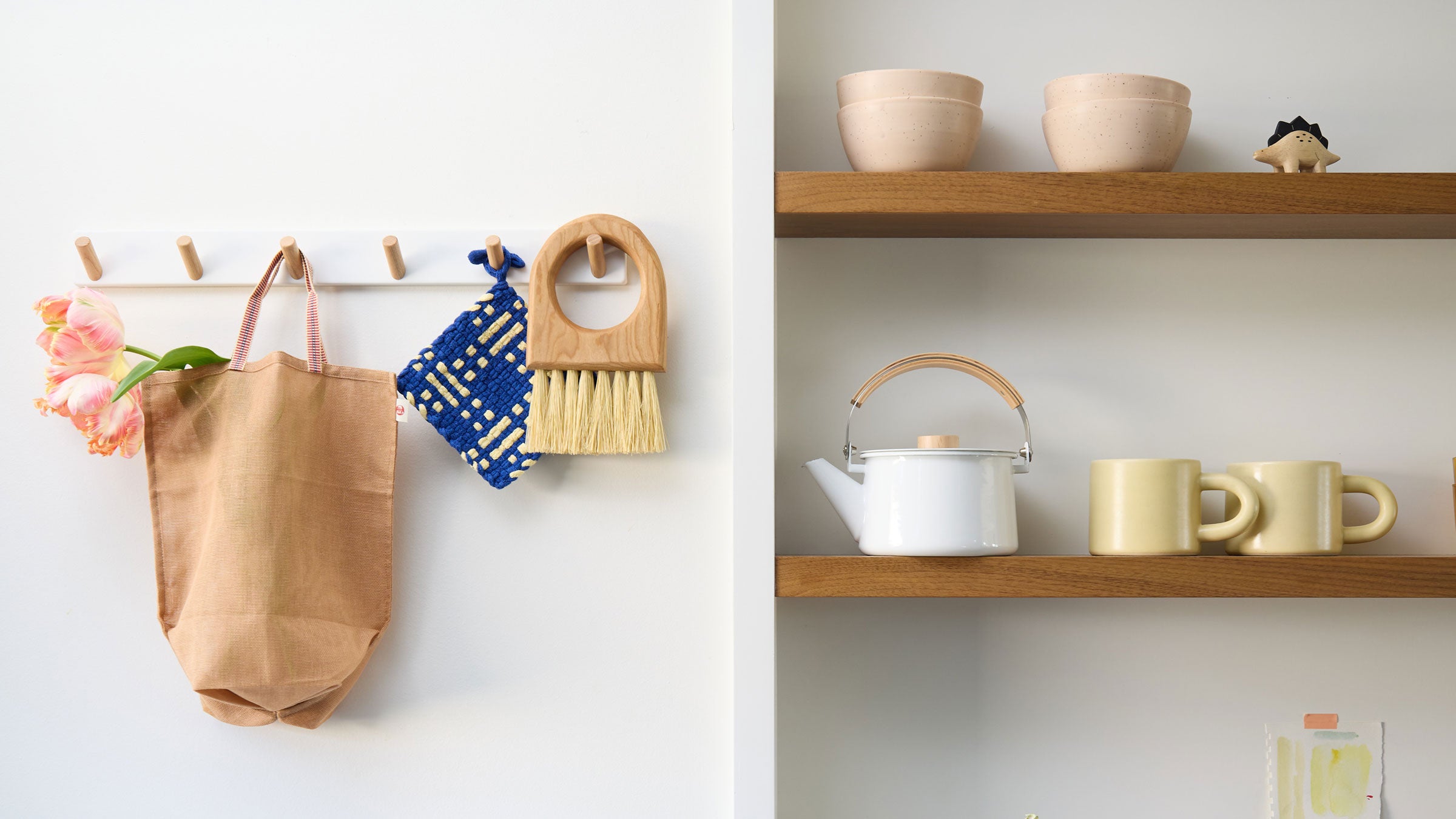 Kitchen shelves with a tea pot and ceramics