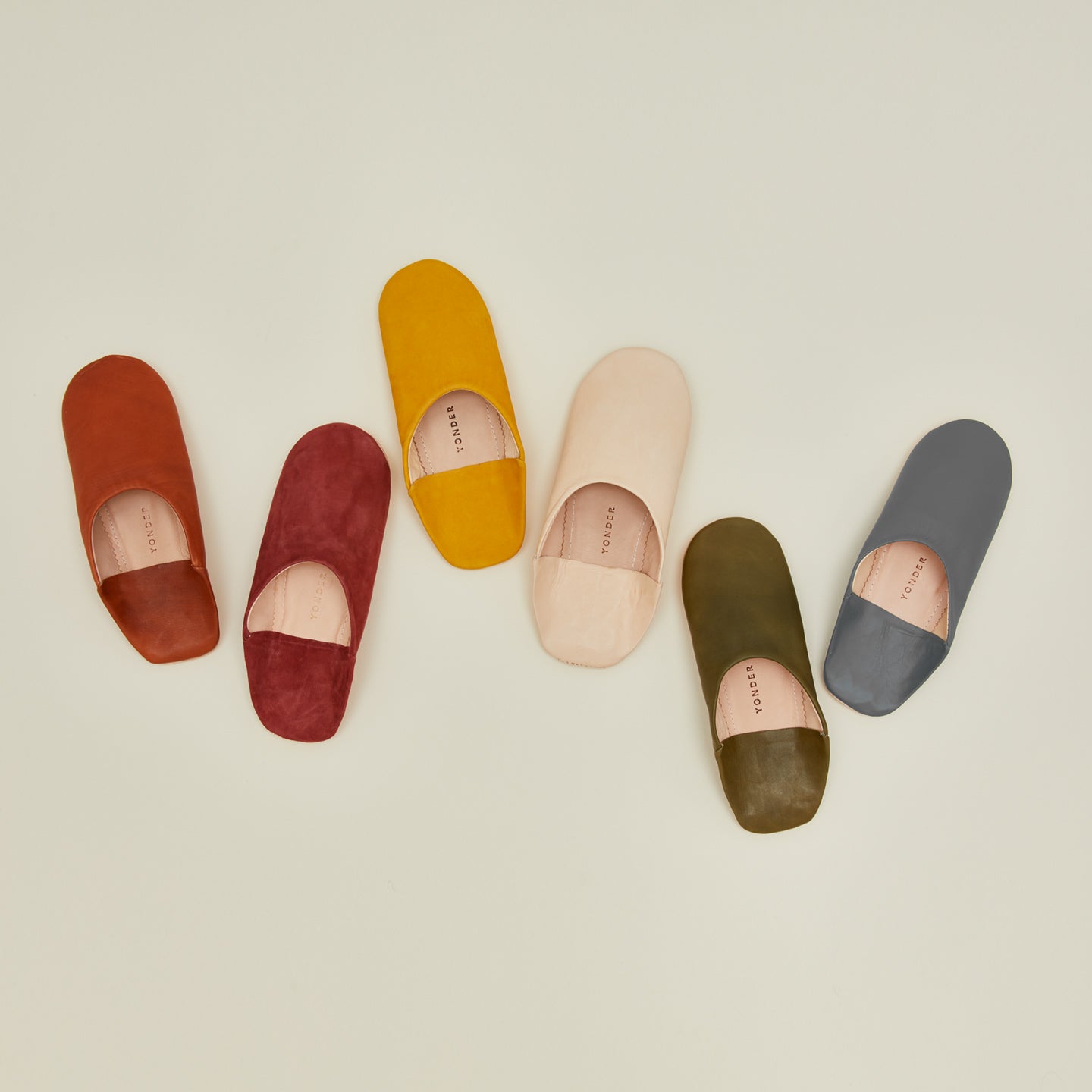 Yonder leather slippers in various colors.