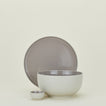Group of Essential serving pieces in Light Grey including bowl, platter and extra small bowl.