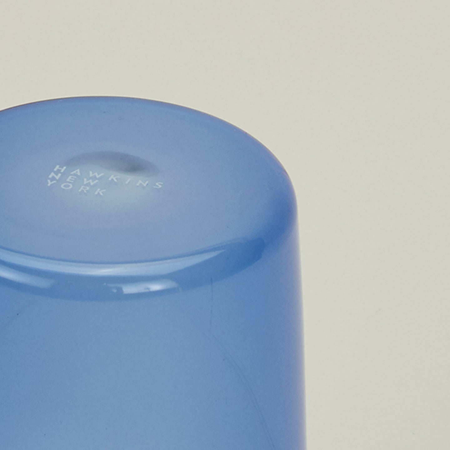 Close up of the bottom of the Essential Glass in Blue.