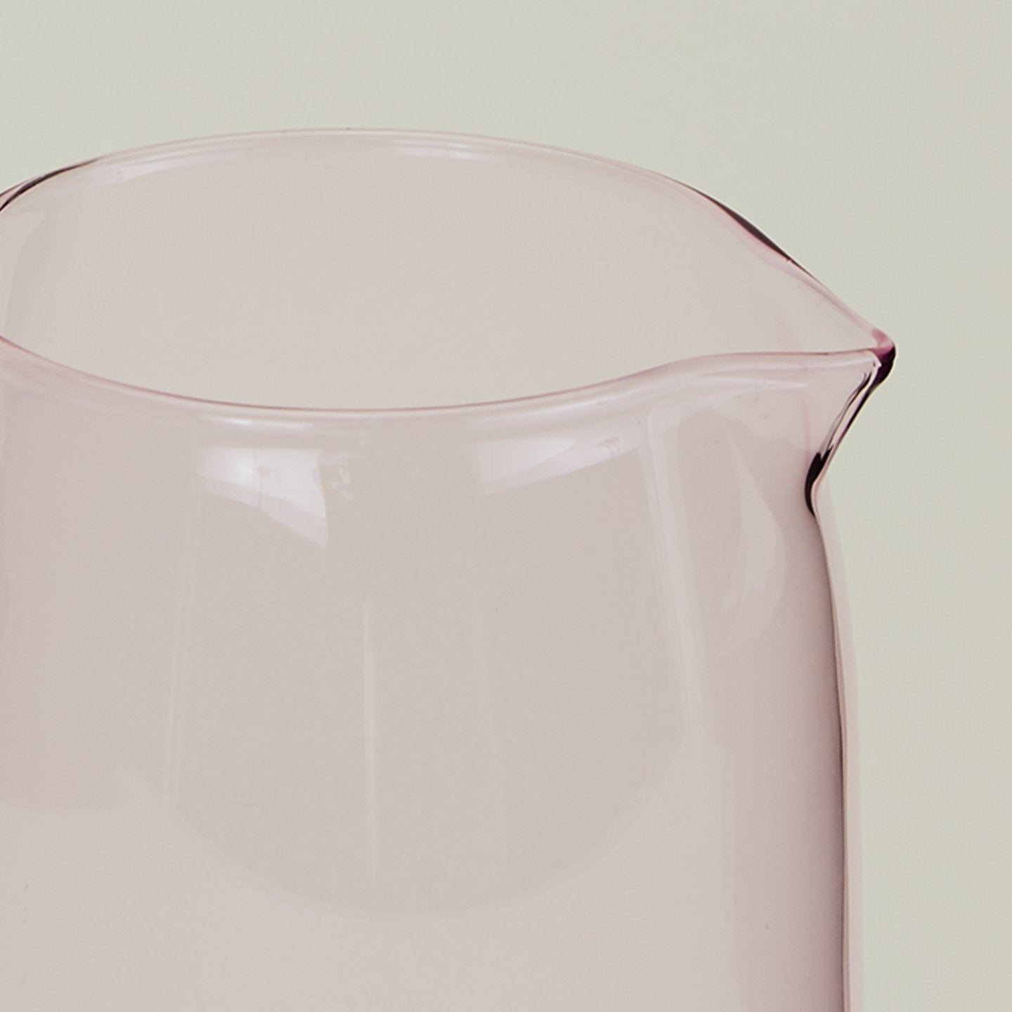 Close up of the rim of the Essential Glassware Pitcher in Blush.