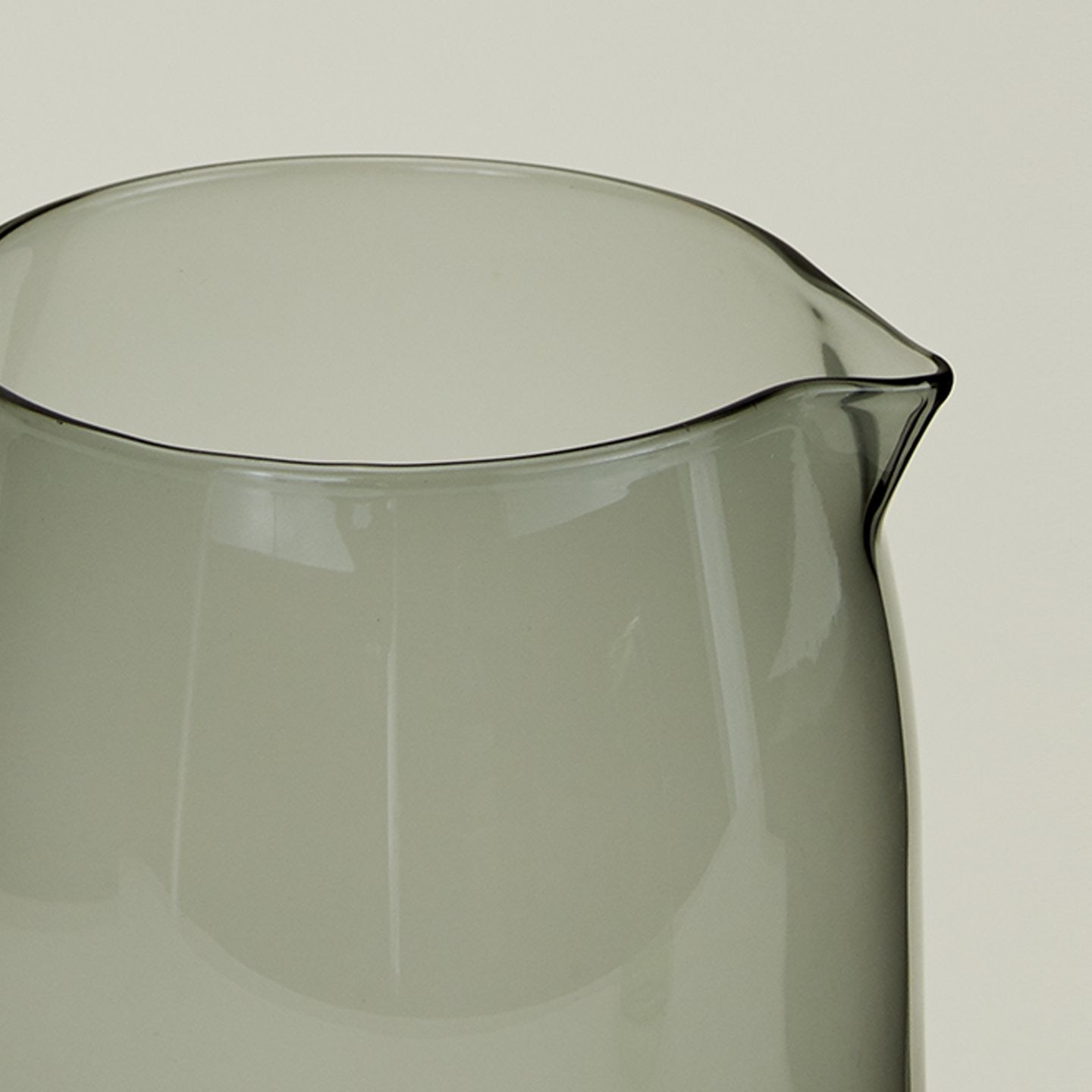 Close up of the rim of the Essential Glassware Pitcher in Smoke.