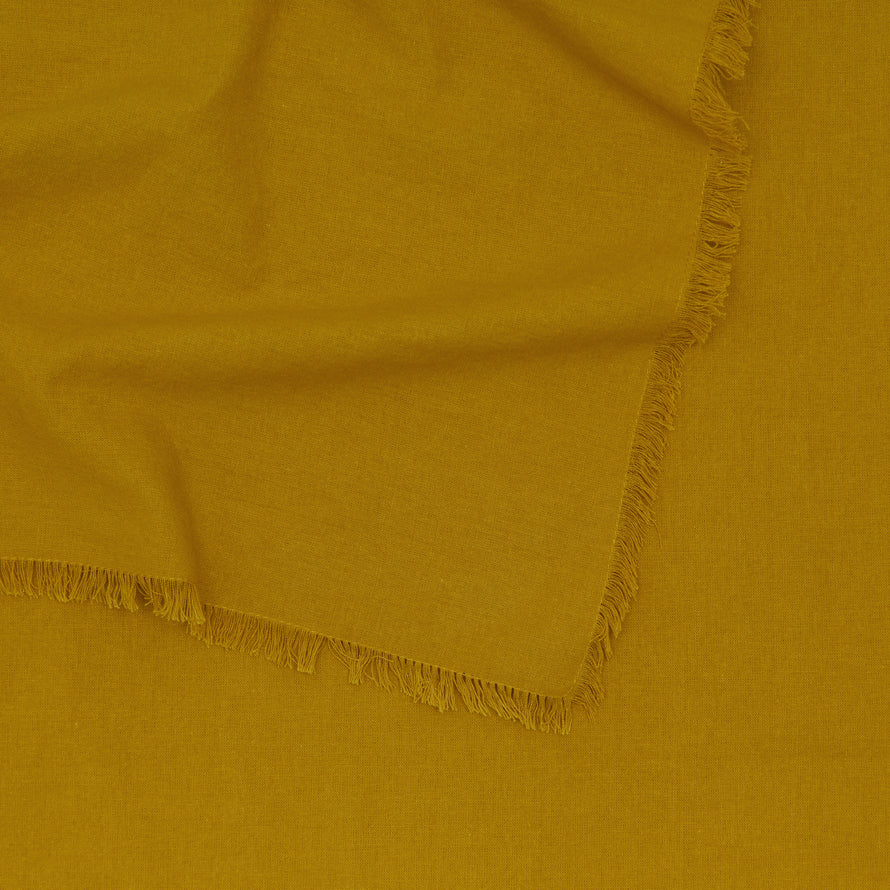 Close up of Essential Striped Tablecloth in Mustard.