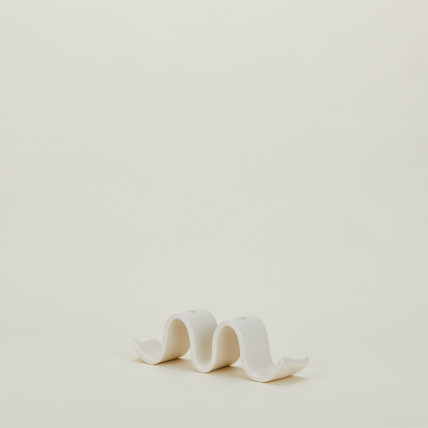 Stoneware Wyn Candelabra viewed from an angle.