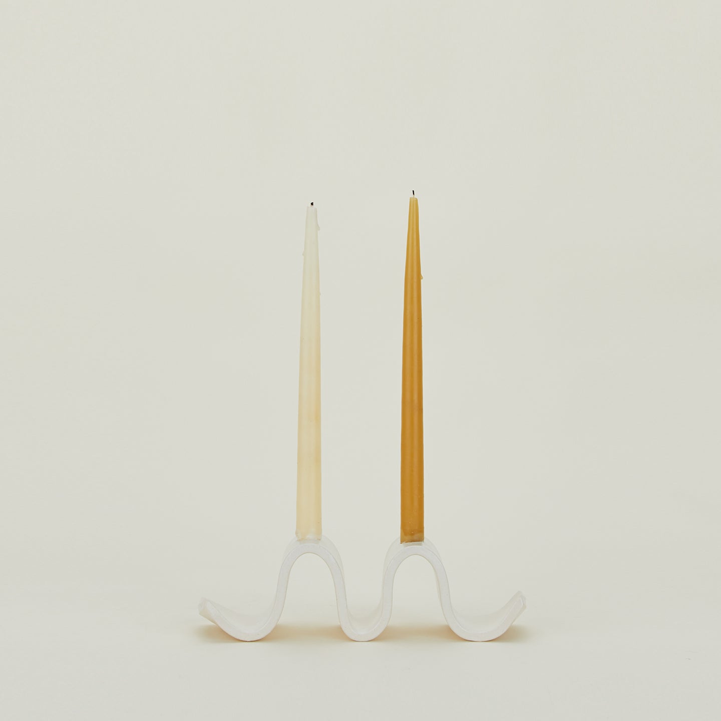 Stoneware Wyn Candelabra with taper candles.
